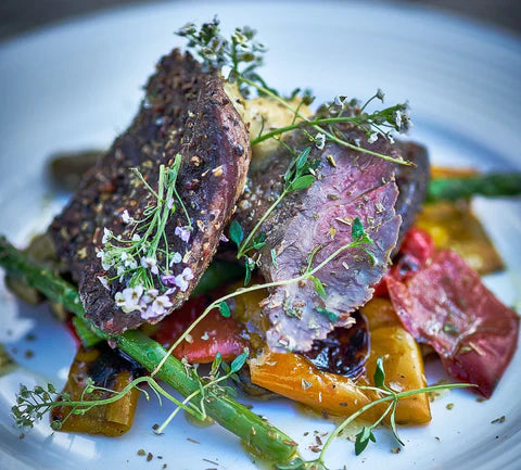 JORGE'S Beef Steak with Seasonal Baby Veg & a drizzle of JORGE Garlic Olive Oil