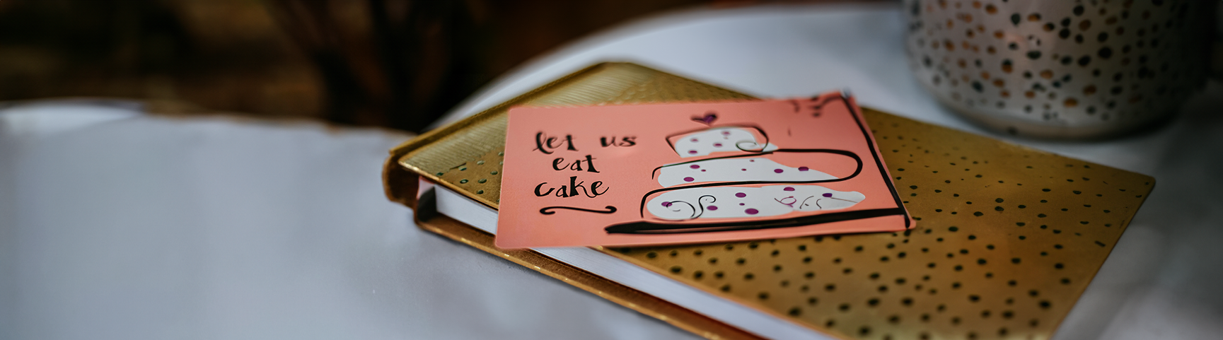Card sat ontop of a golden book